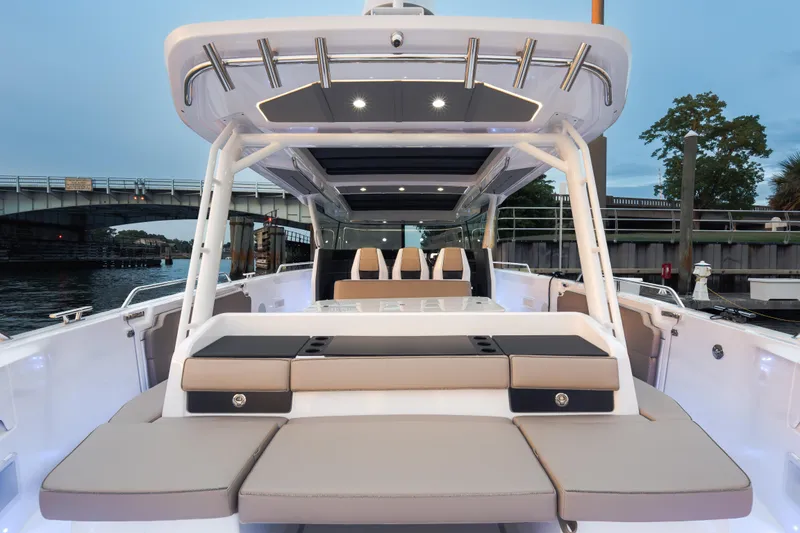Slide: The Image of 2026 Axopar 45 Cross Top boat interior with sleek seating and modern design. - 22