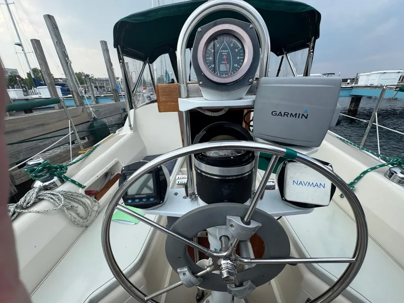 Slide: The Image of Cockpit of 1984 O'Day 34 Sloop with Garmin and Navman navigation equipment. - 22