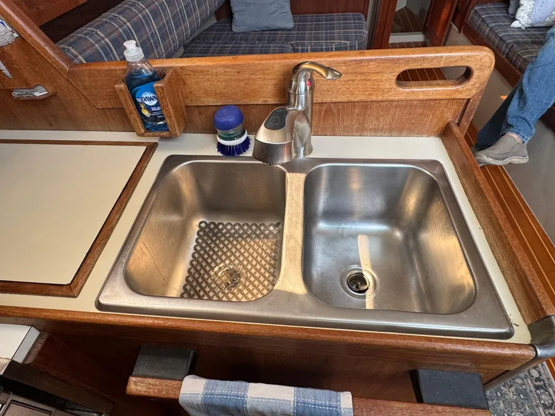 Slide: The Image of Stainless steel double sink in 1984 O'Day 34 Sloop yacht galley. - 7