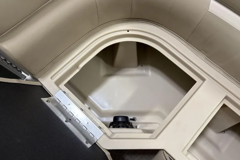 Slide: The Image of 2025 Godfrey Xperience 2086 SBX boat storage compartment with beige interior. - 10