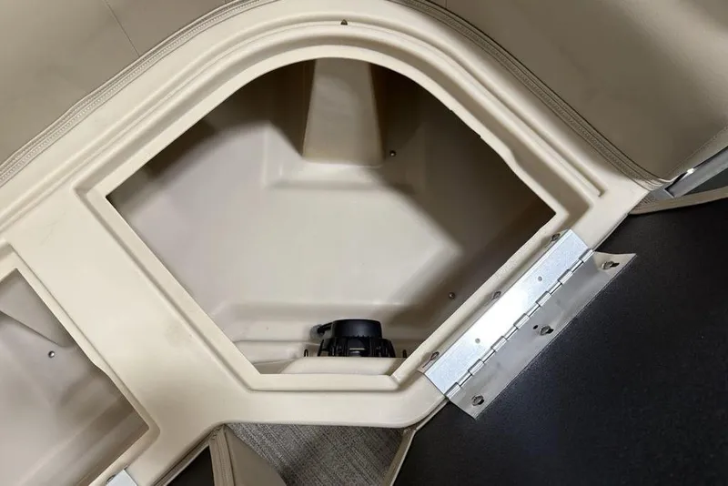 Slide: The Image of Storage compartment of 2025 Godfrey Xperience 2086 SBX boat, featuring beige interior. - 13