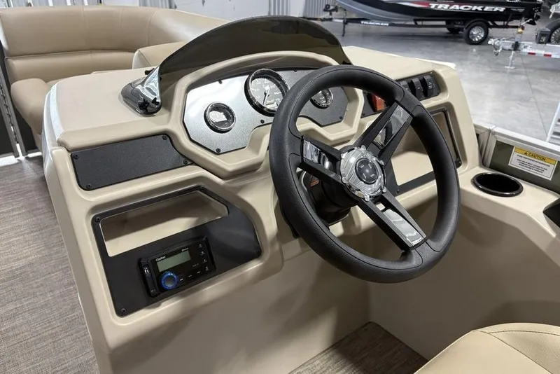 Slide: The Image of Steering console of 2025 Godfrey Xperience 2086 SBX pontoon boat, featuring modern controls. - 15