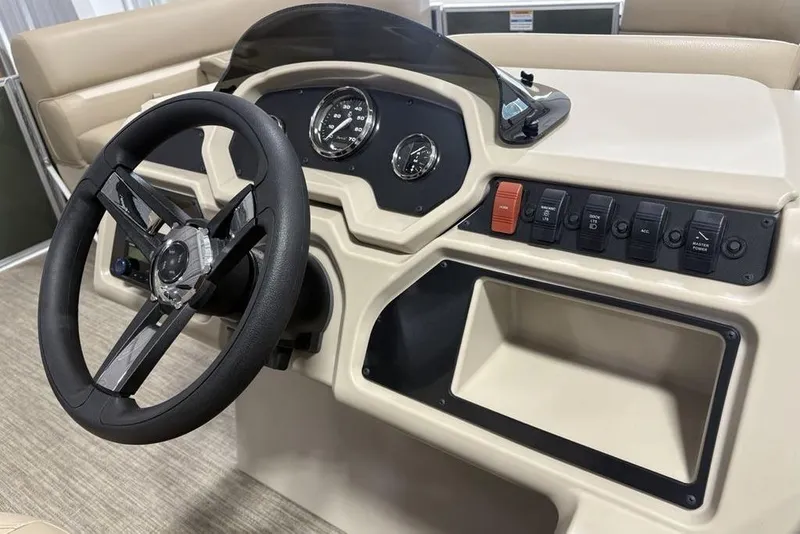 Slide: The Image of Steering console of 2025 Godfrey Xperience 2086 SBX boat with controls and gauges. - 16