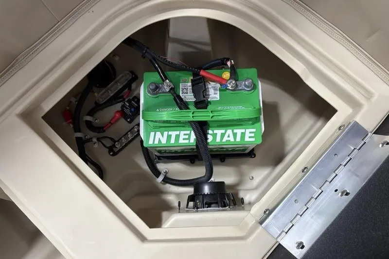 Slide: The Image of Battery compartment of 2025 Godfrey Xperience 2086 SBX with Interstate battery installed. - 27