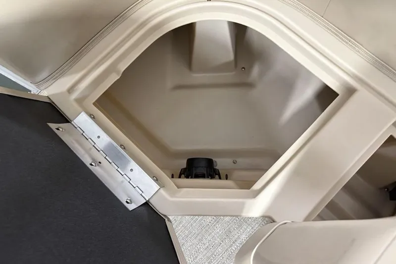 Slide: The Image of Storage compartment in 2025 Godfrey Xperience 2086 SBX boat, featuring beige interior design. - 29