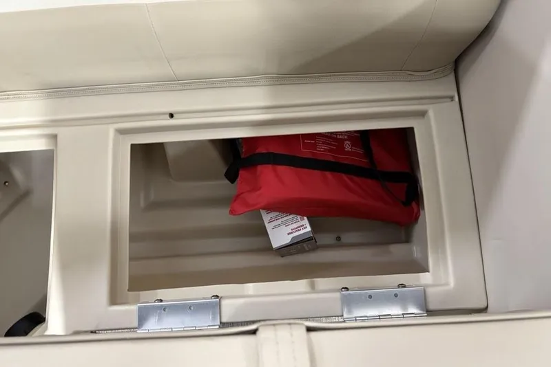 Slide: The Image of Storage compartment in 2025 Godfrey Xperience 2086 SBX with red safety bag. - 31
