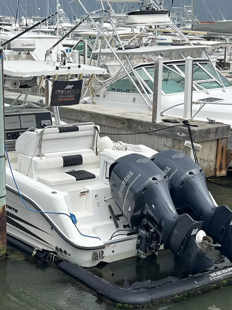 Slide: The Image of 2003 Hydra-Sports Vector 3300 CC boat docked with Yamaha engines. - 12