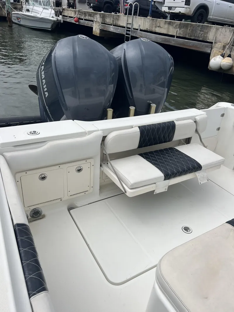 Slide: The Image of 2003 Hydra-Sports Vector 3300 CC boat with dual Yamaha engines at dock. - 6