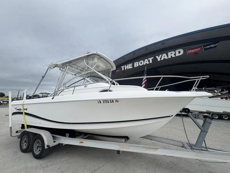 Slide: The Image of 2004 Pro-Line 22 Walk boat on trailer at The Boat Yard. - 11