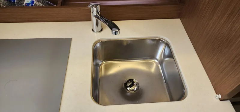 Slide: The Image of Stainless steel sink and faucet in Jeanneau Leader 12.5 WA, 2022 model yacht kitchen. - 21
