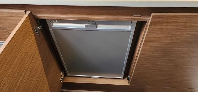Slide: The Image of Built-in refrigerator in 2022 Jeanneau Leader 12.5 WA boat, wooden cabinetry. - 23