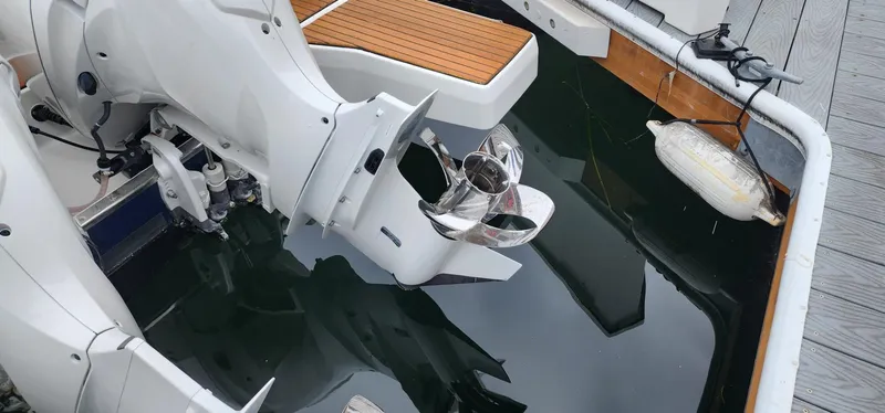 Slide: The Image of 2022 Jeanneau Leader 12.5 WA boat stern with outboard motor and propeller. - 37