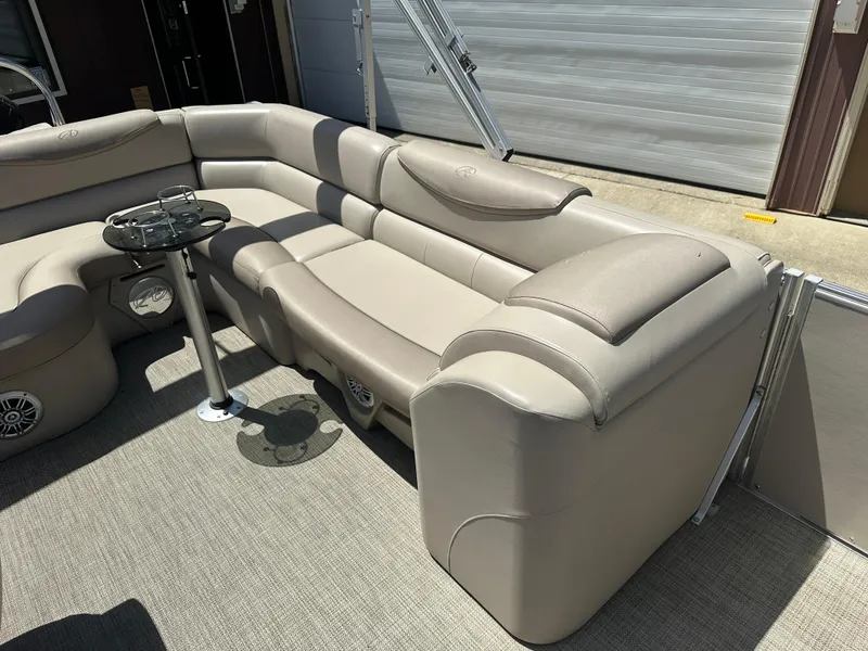Slide: The Image of Luxurious seating on 2018 Avalon Catalina Cruise 25' pontoon boat with beige upholstery. - 11