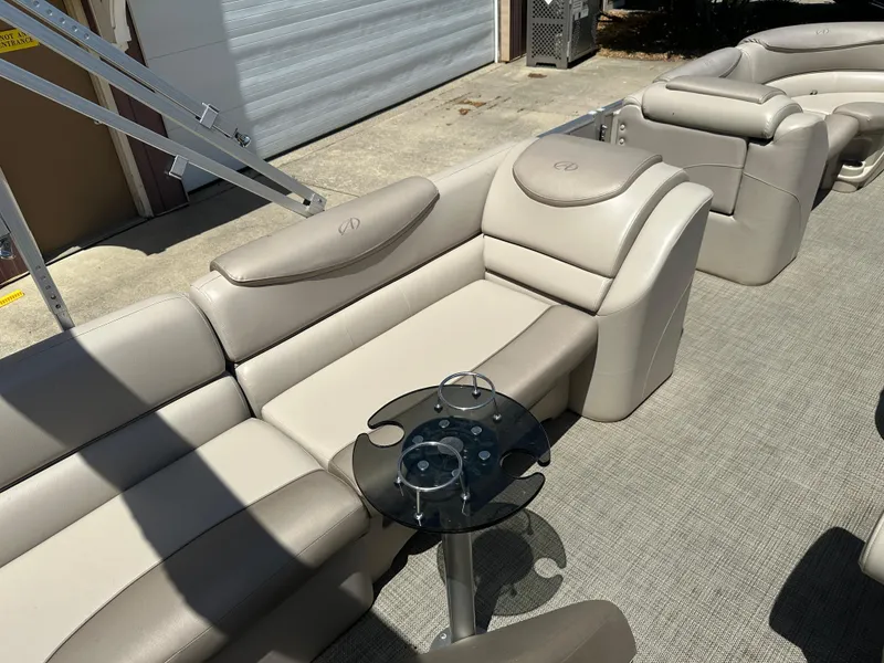 Slide: The Image of Luxurious seating on 2018 Avalon Catalina Cruise 25' pontoon boat with cup holders. - 14