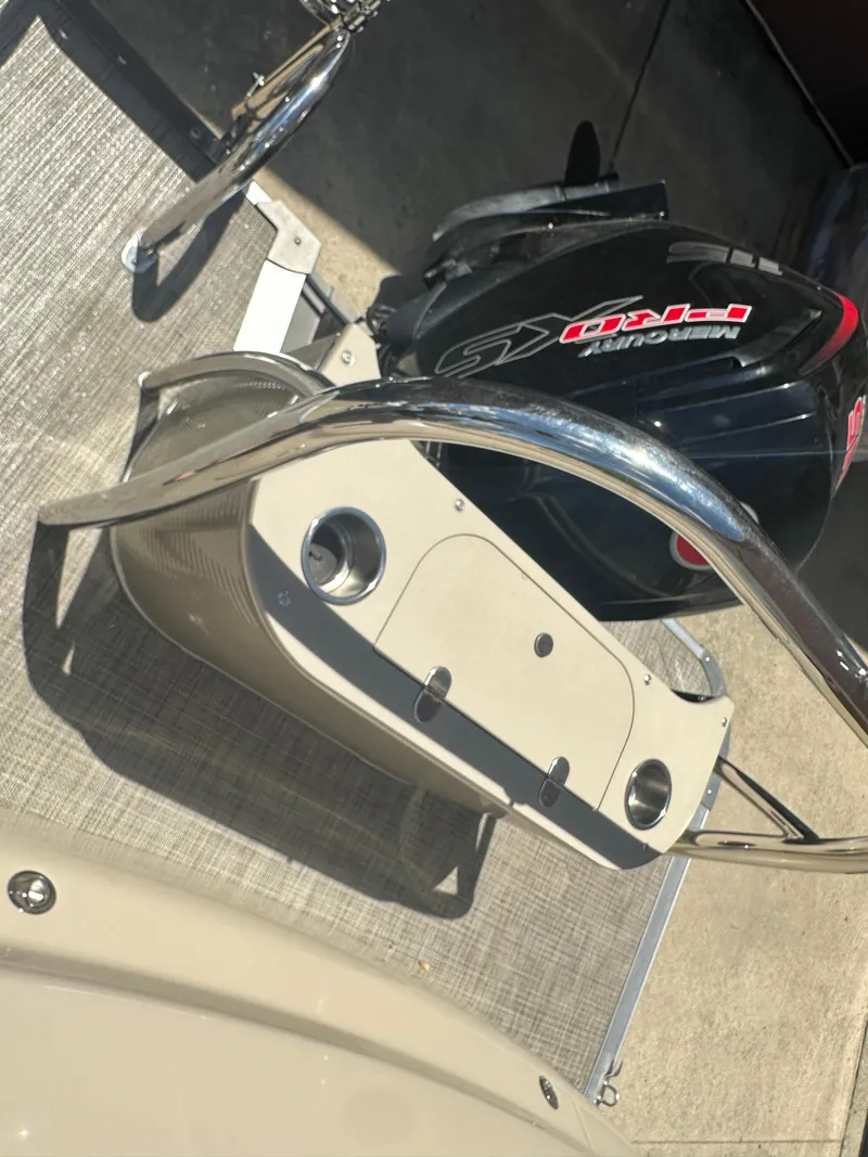 Slide: The Image of 2018 Avalon Catalina Cruise boat with outboard motor, featuring sleek design and modern amenities. - 17