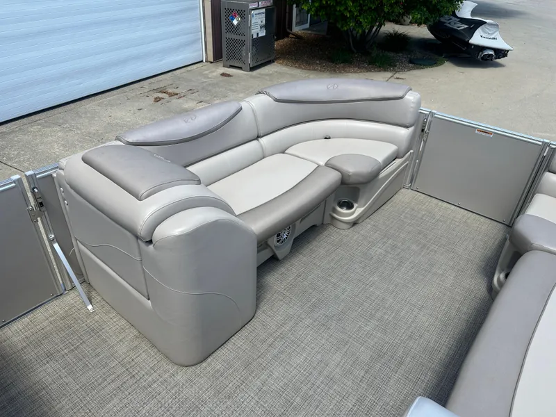 Slide: The Image of Luxurious seating on 2018 Avalon Catalina Cruise 25' pontoon boat, featuring plush gray upholstery. - 7
