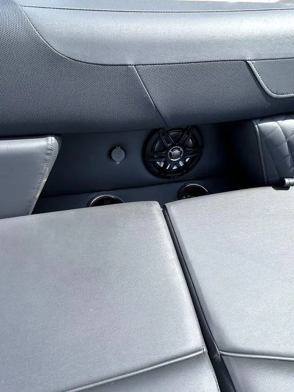 Slide: The Image of 2025 Godfrey Sweetwater 2286 SFLC boat interior with speaker and seating detail. - 12