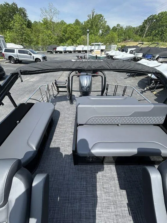 Slide: The Image of 2025 Godfrey Sweetwater 2286 SFLC pontoon boat with spacious seating and modern design. - 9