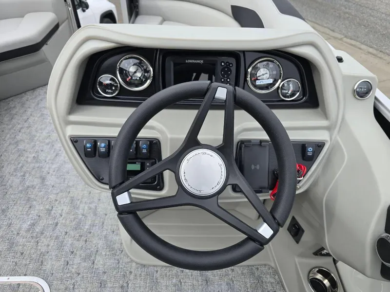 Slide: The Image of Steering wheel and dashboard of 2025 Berkshire 22 RFX LE boat. - 20