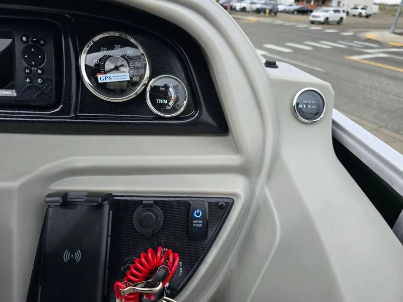 Slide: The Image of Dashboard of 2025 Berkshire 22 RFX LE boat with GPS and control panel. - 22