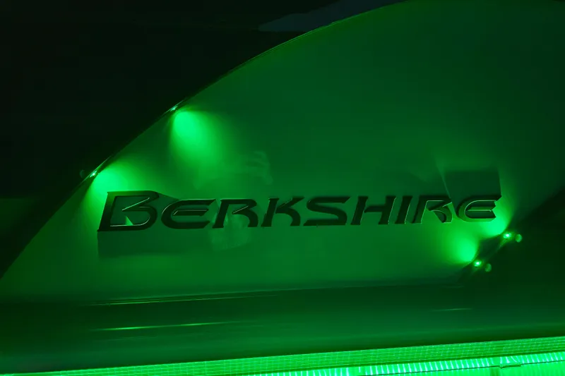 Slide: The Image of Illuminated Berkshire logo on 2025 Berkshire 22 RFX LE boat in green lighting. - 30