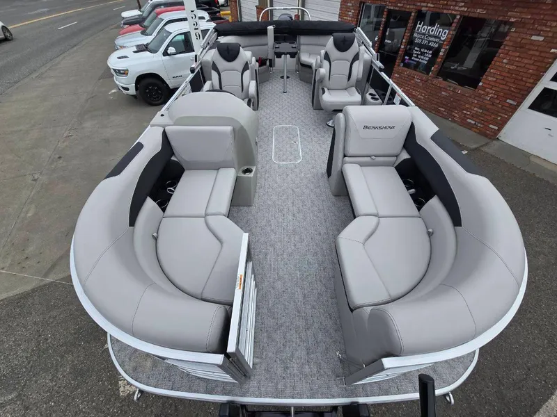 Slide: The Image of 2025 Berkshire 22 RFX LE pontoon boat with spacious seating and modern design. - 6