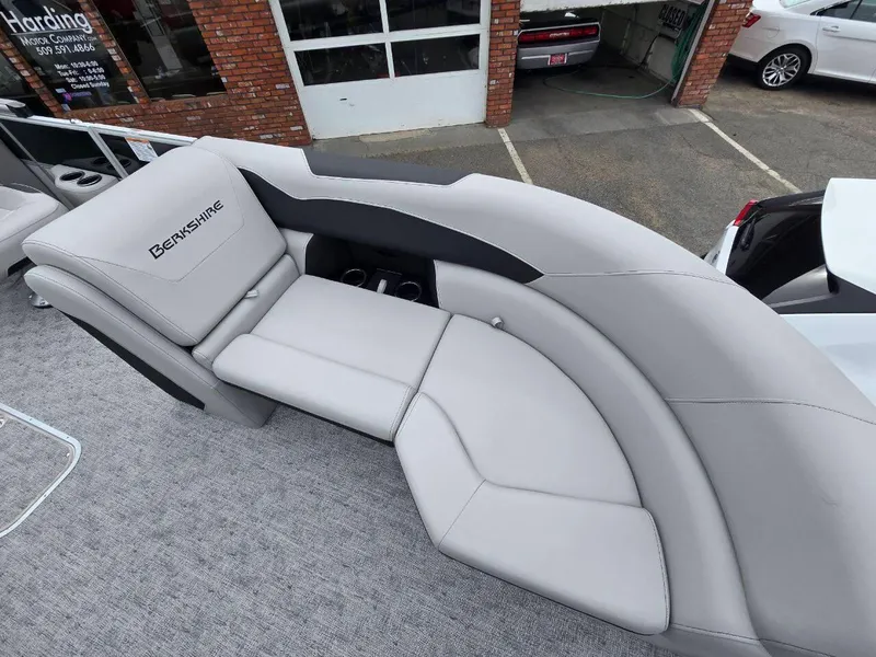 Slide: The Image of 2025 Berkshire 22 RFX LE boat interior with gray seating and cup holders. - 7