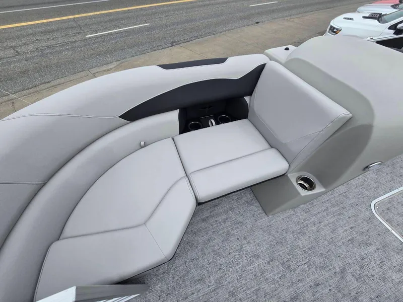 Slide: The Image of 2025 Berkshire 22 RFX LE boat interior with gray seating and cup holders. - 8