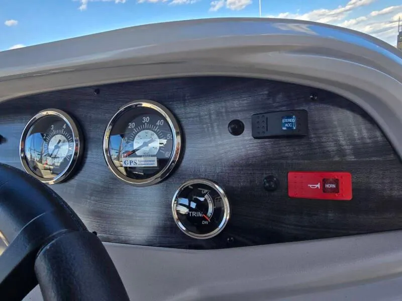 Slide: The Image of Dashboard of a 2025 Berkshire 20 CL boat with gauges and controls. - 11