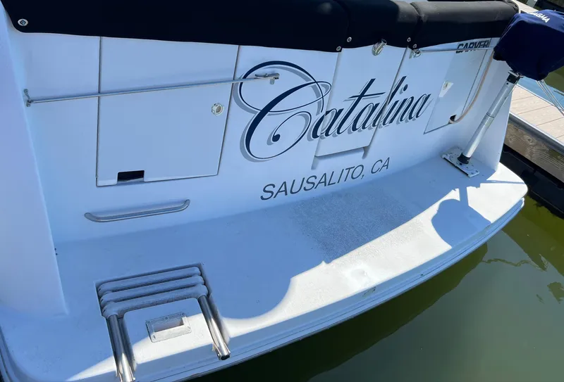 Slide: The Image of Stainless steel Magma grill on a 1997 Carver 350 Mariner boat. - 10