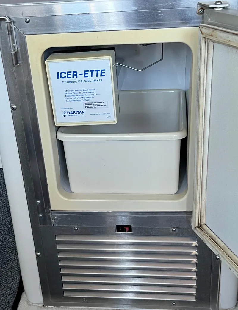 Slide: The Image of Built-in ice maker on a 1997 Carver 350 Mariner boat. - 37