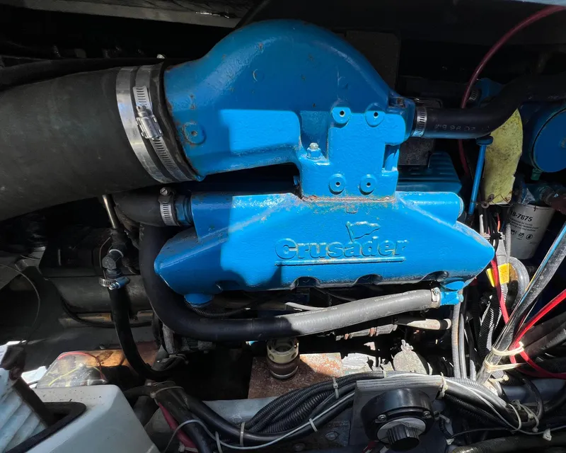 Slide: The Image of Engine of 1997 Carver 350 Mariner with blue Crusader components. - 40