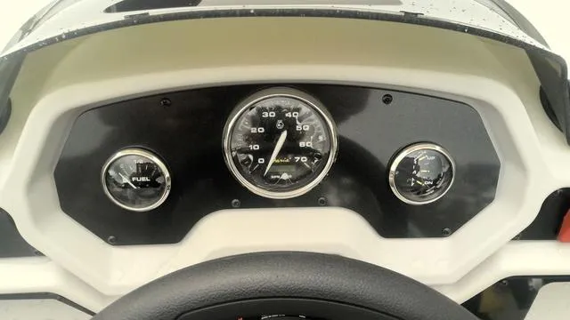 Slide: The Image of Dashboard of 2025 Godfrey Pontoons Xperience 2286 SBX with speedometer and fuel gauge. - 9