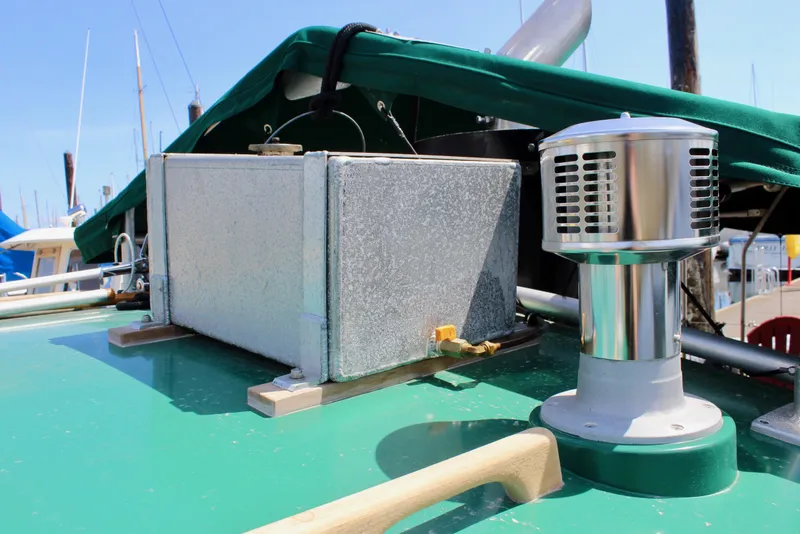 Slide: The Image of 1961 Custom 32' William Garden Tugboat deck with metal box and ventilation system. - 11