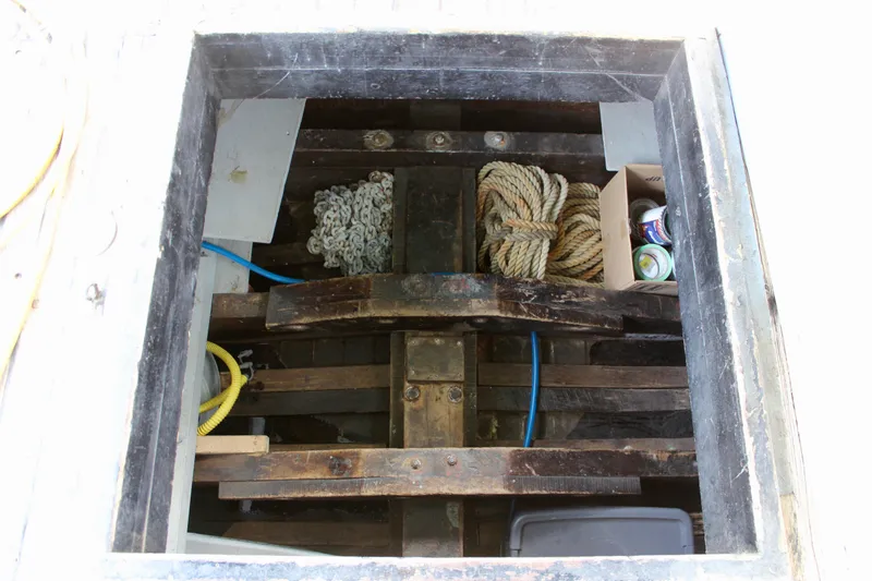 Slide: The Image of Open hatch of 1961 Custom 32' William Garden Tug showing ropes and supplies. - 14