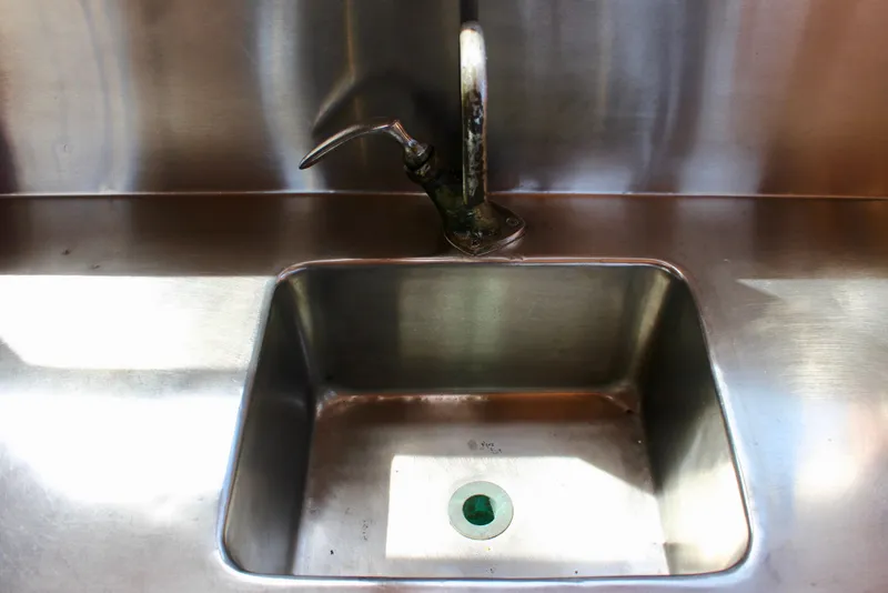 Slide: The Image of Stainless steel sink with faucet on 1961 Custom 32' William Garden Tug. - 20