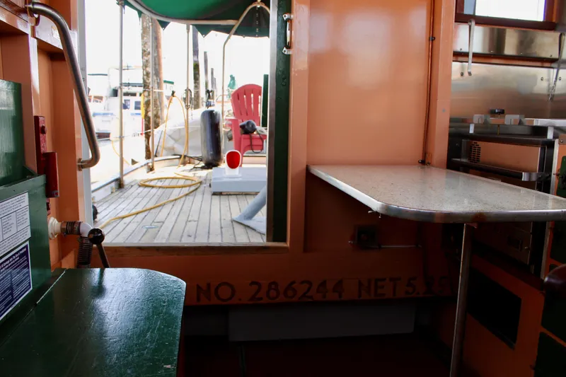 Slide: The Image of Interior view of a 1961 Custom 32' William Garden Tugboat with dockside access. - 22