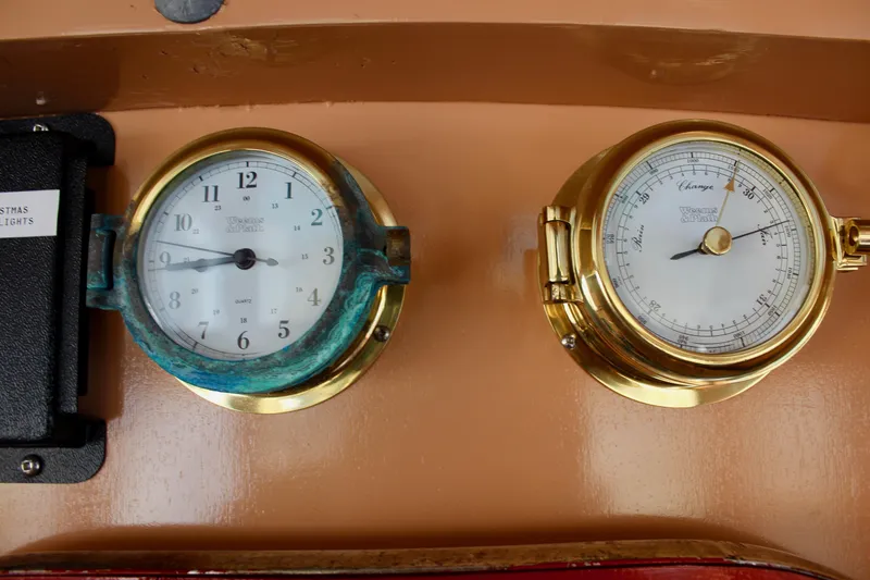 Slide: The Image of Vintage brass clock and barometer on 1961 Custom 32' William Garden Tug. - 23