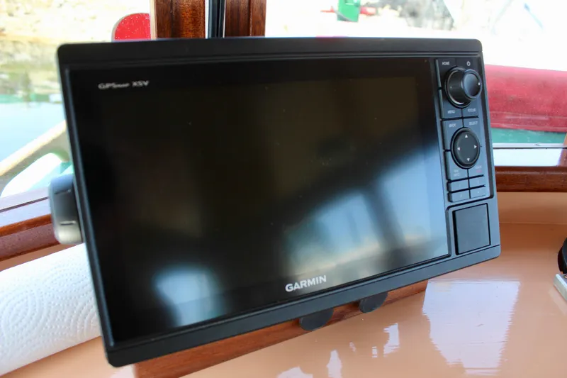 Slide: The Image of Garmin GPS device on 1961 Custom 32' William Garden Tugboat dashboard. - 25