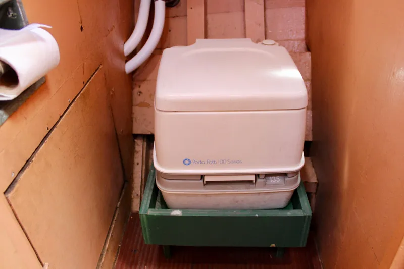 Slide: The Image of Portable toilet inside 1961 Custom 32' William Garden Tug boat. - 30