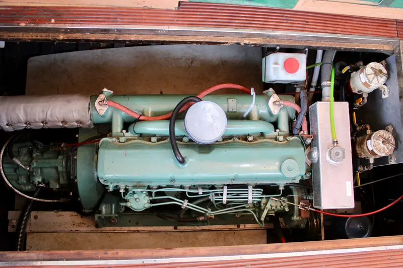 Slide: The Image of Engine of 1961 Custom 32' William Garden Tug, showcasing vintage mechanical design. - 35