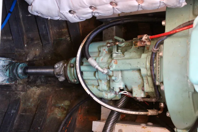 Slide: The Image of Engine compartment of a 1961 Custom 32' William Garden Tug, showing mechanical components and wiring. - 36