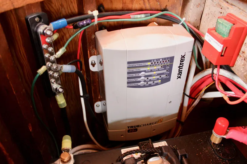 Slide: The Image of Electrical system of a 1961 Custom 32' William Garden Tug with Xantrex charger. - 38