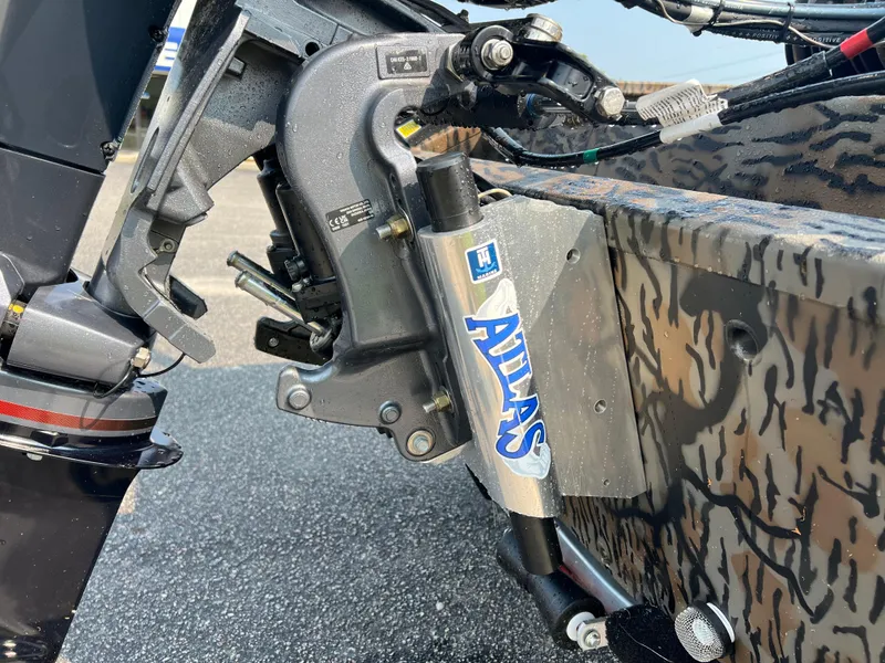 Slide: The Image of Close-up of 2025 Xpress H20B boat motor with Atlas hydraulic jack plate. - 15