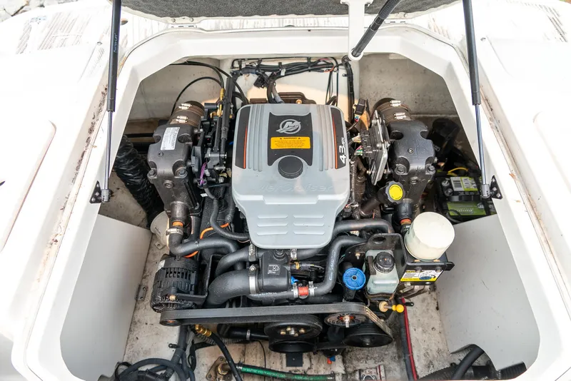 Slide: The Image of 2014 Chaparral 21 Ski & Fish H2O engine compartment, showcasing detailed mechanical components. - 22