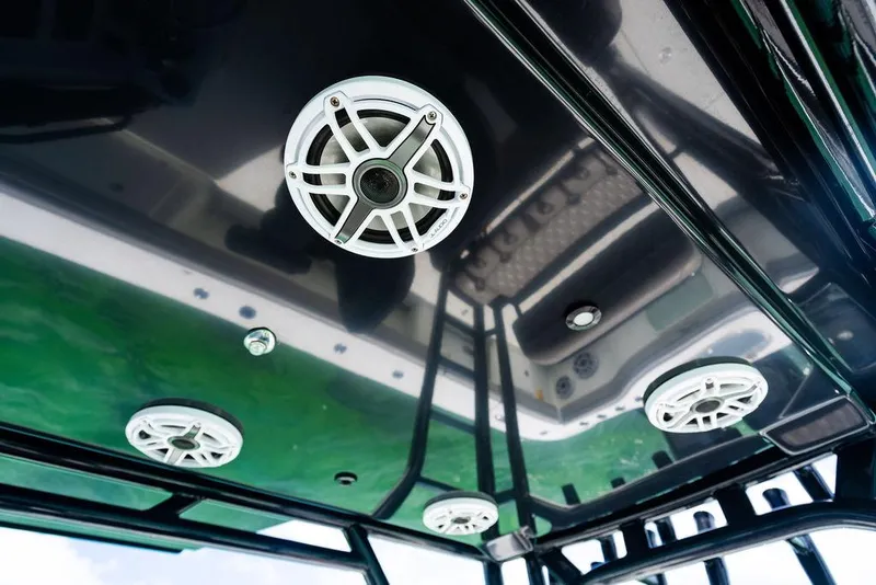 Slide: The Image of 2015 Yellowfin CC boat speakers on glossy black ceiling. - 19