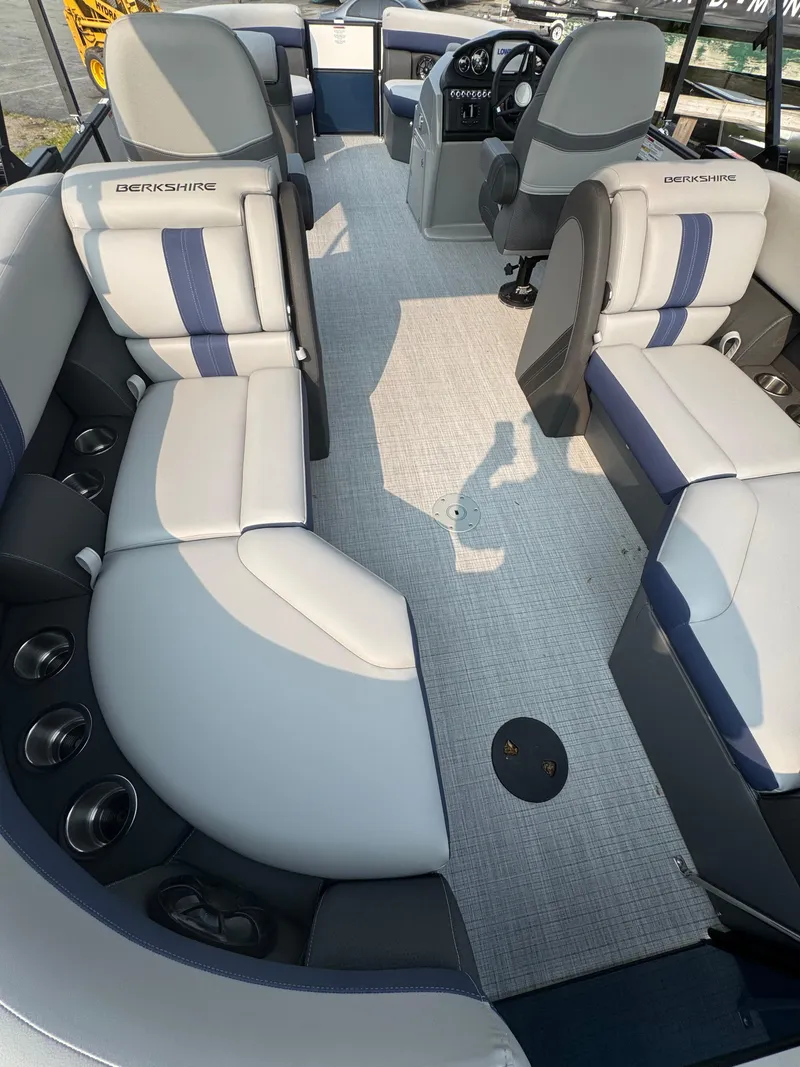 Slide: The Image of Interior of 2025 Berkshire 22RFX CTS boat with spacious seating and modern design. - 10