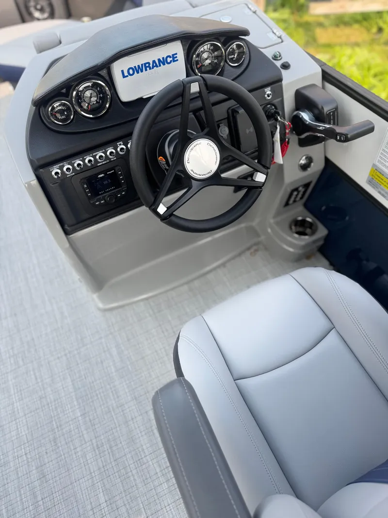 Slide: The Image of Helm of 2025 Berkshire 22RFX CTS boat with Lowrance navigation system. - 9