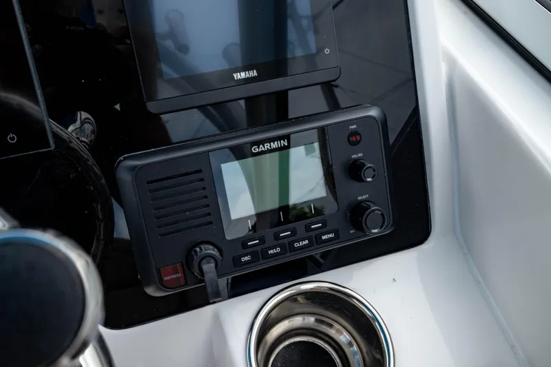 Slide: The Image of Garmin marine electronics on 2026 Edgewater 248 CX boat dashboard. - 28