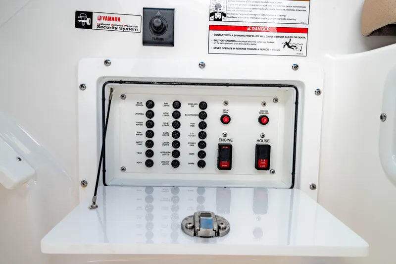 Slide: The Image of Electrical panel of 2026 Edgewater 248 CX boat with Yamaha security system. - 32